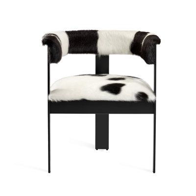 Boasting an art modern influence, the Darcy Dining Chair features a leather seat and a streamlined stainless steel frame in a polished finish. Upholstery Color: Leather Hide Spotted, Frame Color: Matte Black | Interlude Darcy Leather Upholstered Metal Arm Chair Upholstered in White / Black | Wayfair Metal Arm Chair, Metal Armchair, Metal Arm, Meridian Furniture, Leather Hide, Velvet Dining Chairs, Upholstered Arm Chair, Stainless Steel Frame, Mellow Yellow