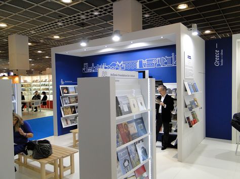 Exhibition Design 12th International book fair of Thessaloniki on Behance Book Fair Exhibition Stand Design, Book Fair Booth Design, Signage Exhibition, Book Exhibition, Exhibition Stall Design, Stall Design, Book Displays, Fair Display, Identity Inspiration