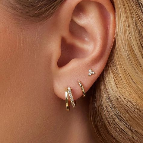 Enhance your style with this elegant 3-piece set of earrings, designed for women who love a modern, yet timeless look. Made from 925 Sterling Silver with a beautiful gold finish, this set includes double hoop earrings and mini zircon stud earrings to create a layered, chic appearance. Whether for daily wear or a special occasion, these hypoallergenic earrings are perfect for sensitive ears. ✨ Product Details: Material: 925 Sterling Silver with a double-layered gold finish Design: Set includes 2 Dainty Earrings Studs, Leaf Earrings Stud, Personalized Gifts For Women, Cartilage Earrings Hoop, Hoop Earring Sets, Women Gifts, Holiday Jewelry, Huggie Earrings, Hypoallergenic Earrings