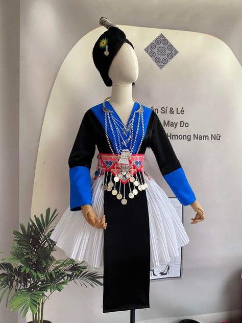 Embrace the beauty of cultural diversity and make a fashion statement with our Hmong Vintage Handmade Dress. Experience the elegance, artistry, and soul of the Hmong people, embodied in this exquisite garment. This whole outfit includes a shirt, skirt, apron and embroidered belt. The hat isn't included in the set.  If you want to buy the hat, please choose both options for the outfit and hat. Please note that due to the handmade nature of these dresses, each piece may have slight variations of p Hmong Modern Dress, Modern Hmong Clothes, Hmong Traditional Clothing, Hmong Clothes Traditional, Tribe Outfit, Hmong Dress, Hmong Clothing, Outfit Traditional, Hmong Fashion