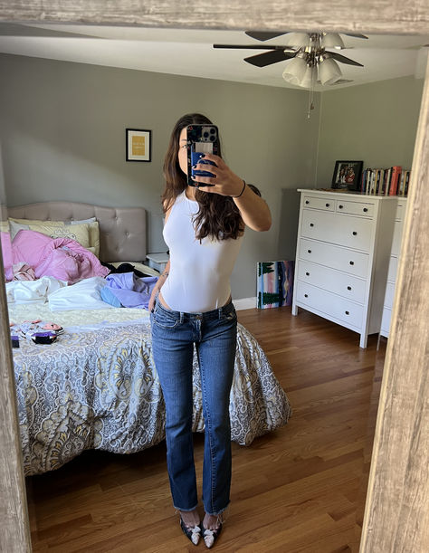 Girl wearing a white stretchy tank top bodysuit, incredibly soft and form-fitting, styled for a sleek and comfortable look White Bodysuit Outfit Ideas, Tank Top Bodysuit, Fashion Basics, Body Suit Outfits, Closet Staples, White Bodysuit, Basic Style, Layering Pieces, Wardrobe Essentials