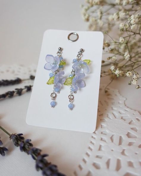 lavila🌱 on Instagram: "Shrink Plastic Earrings ‘Blue Hydrangea’  925 Sterling Silver, Hypoallergenic Steel, Stainless Steel Earring Posts Materials: •stainless steel •glass beads •shrink plastic Shipping: I ship using usps to the US only, will ship your order within 1-3 days You can find the purchase link in my profile description💗 #shrinkplastic #shrinkplasticart #makingjewelry #jewelry #phonecharm #acccessories #necklace #earrings #handmadephonecharm #hairpins #handmadehairpins #handmadenecklace #handmadeearrings #smallbusiness #smallbusinessowner #smallbusinesssupport #lavilajewelry" Shrink Plastic Ideas, Hydrangea Jewelry, Hydrangea Aesthetic, Hydrangea Earrings, Diy Shrink Plastic Jewelry, Shrink Plastic Earrings, Diy Shrink Plastic, Accessories Idea, Shrink Plastic Jewelry