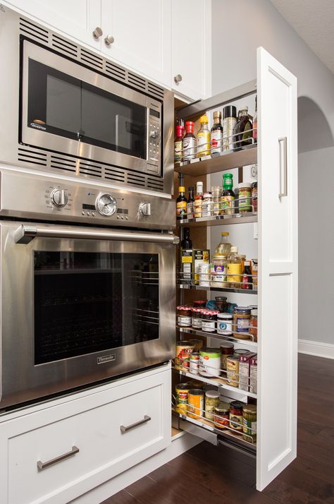 A vertical pull-out rack is genius kitchen storage solution for spices, sauces, and oils Kitchen Renovation Inspiration, Just Tired, Kitchen Remodel Design, Kitchen Remodel Before And After, Kitchen Remodel Ideas, Kitchen Room Design, Kitchen Inspiration Design, Kitchen Remodeling Projects, Kitchen Redo