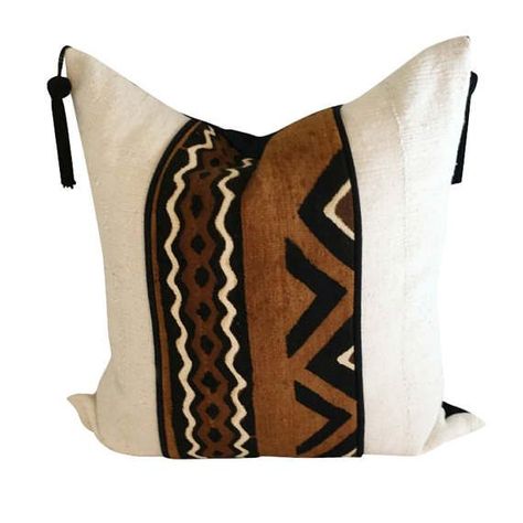 The rust color in the pillow is reminiscent of the hearty red clay of the African continent which symbolizes Mother Nature. The bold anchor color is then combined with solid white mud cloth for balance. Black tassels have been added for a posh contemporary look. The back of the pillow is made of black Irish linen and it is closed with an invisible zipper. Afrocentric Decor, African Pillow, African Interior Design, African Furniture, African Inspired Decor, African Interior, Ethno Style, Style Africain, African Continent