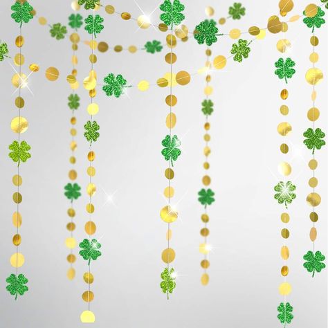 PRICES MAY VARY. 4 strings of 13 ft green glitter four-leaf clover and gold circle garlands, totally 52 ft. Each clover is 3.2 inch wide This glittering paper shamrock streamer kit is specifically designed for the Irish St. Patrick’s Day or any spring celebrations. It combines the beautiful natural green and the glamorous gold colors together and brings about a lively, cheerful and prosperous ambience at home or parties The four leaf garlands are perfect for St Patrick's Day celebration or any S Sant Patrick, Irish Party, Streamer Backdrop, Circle Garland, Irish Baby, Spring Birthday, St Patrick's Day Decorations, Green Garland, Spring Celebration