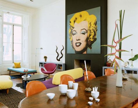 Pop Art takes center stage here in the form of Marilyn's Monroe's portrait by Andy Warhol.  Other furnishings are in bold, bright colors, done in the spirit of POP ART style. Arne Jacobsen's Swan Chair, a chair from the same era as Pop Art, is mixed in, in a hot pink color. #popart #andywarhol # Warhol Pop Art, Andy Warhol Pop Art, Wall Lamp Design, Chic Interior Design, Living Room Photos, Chic Interior, Deco Furniture, Art Deco Furniture, Interior Deco