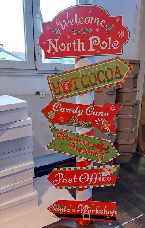 Christmas Grotto Decorations, Christmas Poles Diy, Christmas Directional Signs Diy, North Pole Party Ideas, Santas Work Shop Decoration, Christmas Decor Signs Diy, Diy North Pole Decoration, North Pole Christmas Decorations Diy, North Pole Sign Diy