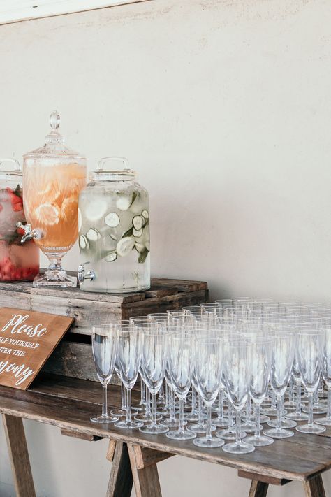 Elevate your wedding reception with a chic Hydration Stations! Choose from a Service Bar or Timber Trestle Table, complete with drink dispensers, glassware, and drink buckets for your alcohol. Cheers to unforgettable celebrations! 🥂💍  Contact HYRE EVENTS to customize your perfect drink station. Visit www.hyreevents.com.au for more details!  #hyreevents #eventrental2024 #furnituregoals #furnitureforrent #eventstyling #eventdecor #luxuryrentals #sydneyevents #sydneyweddings #sydneyfunctions Rehearsal Dinner Drink Station, Diy Drink Station Wedding, Elegant Drink Station, Drink Serving Station, Wedding Food Stations Bbq, Selfserve Bar Wedding, Drink Station For Party, Drink Set Up For Party Beverage Stations, Self Service Bar Drink Stations