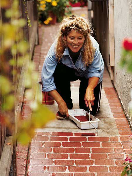 DIY: paint your own faux-brick sidewalk Brick Sidewalk, Door Basket, Tees Design, Cotton Wreath, Faux Brick, Brick Road, Painted Brick, Holiday Wreath, Logo Shirt