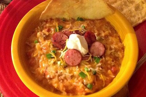 Creamy Spanish Rice Soup Recipe - Allrecipes.com | Allrecipes Spanish Rice Soup Recipe, Knorr Spanish Rice, Spanish Flan, Soup Sausage, Cream Cheese Sausage, Creamy Wild Rice Soup, Soup With Sausage, Recipes Using Ground Beef, Rice Soup Recipes