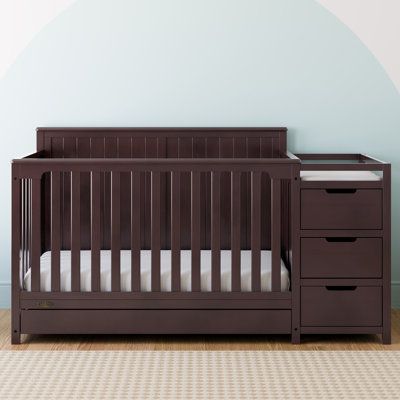 The Graco Hadley 5-in-1 Convertible Crib and Changer with Drawer was designed with safety, innovation, and convenience in mind. Available in White, Espresso, and Pebble Gray baby-safe, non-toxic finishes, the Hadley features a spacious drawer for easy storage of nursery essentials, and converts from crib to toddler bed, day bed, and full-size bed to grow with your baby throughout life’s multiple stages. Like all Graco cribs, the Hadley is certified by the Juvenile Products Manufacturers Associat Baby Stuff Cribs & Toddler Beds, Cribs For Small Spaces, Wooden Baby Crib, Crib Conversion Kit, Crib To Toddler Bed, Bed Day, Best Baby Cribs, Baby Cribs Convertible, Baby Crib Mattress