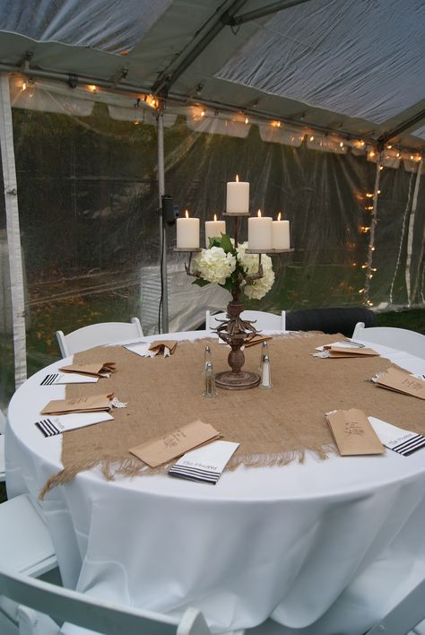 Reception. I like the burlap on top of the white table cloth! Hessian Table Cloth, Burlap Table Runner Ideas, Square Table Cloth On Round Table, Rustic Table Cloth, Round Table Wedding, Rehearsal Dinner Ideas, Wedding Dinner Decor, Wedding Rehearsal Dinner Decorations, Round Wedding Tables