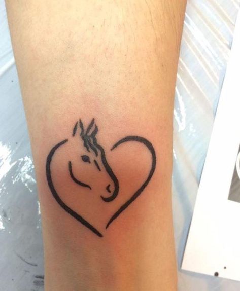 15 Beautiful Horse Tattoos and their Meaning - easy.ink™ Horse Heart Tattoo, Land Tattoos, Equine Tattoo, Small Horse Tattoo, Horse Tattoos, Love Heart Tattoo, Horse Shoe Tattoo, Horse Tattoo Design, Cowgirl Tattoos