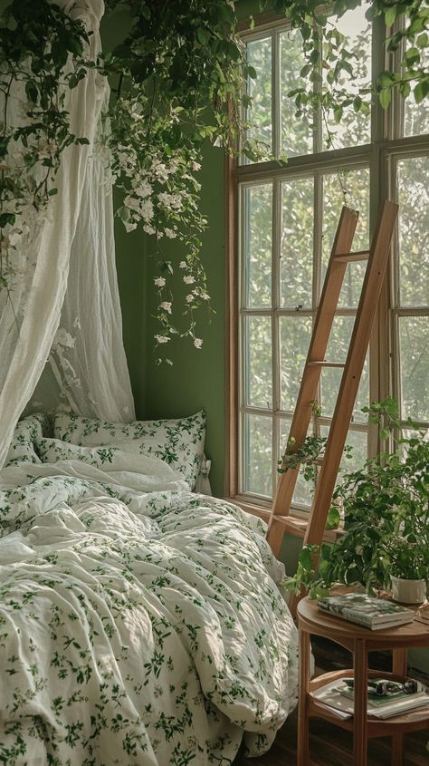 Cozy green bedroom with floral patterns, canopy bed, plants, and a wooden ladder, embodying charming cottagecore style. Nature Bedrooms, Charming Bedroom Ideas, Canopy Bed Drapes, Room With Natural Light, Bedroom Concept, Bed Drapes, Lush Plants, Natural Bedroom, Potted Flowers