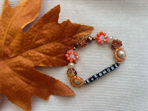 Embrace the beauty of autumn year-round with our Evermore Autumn-Inspired Friendship Bracelets! 🍂🧡🍁 Handcrafted with love, these bracelets capture fall's vibrant hues – from the golden yellows to fiery oranges and deep reds. 🍂🍂 Perfect for celebrating the changing seasons or sharing with a friend. Fall Inspired Bracelets, Spooky Sleepover, Inspired Bracelets, Orange Bracelet, Autumn Inspired, Taylor Swift Eras, Changing Seasons, Autumn Inspiration, Fall Thanksgiving