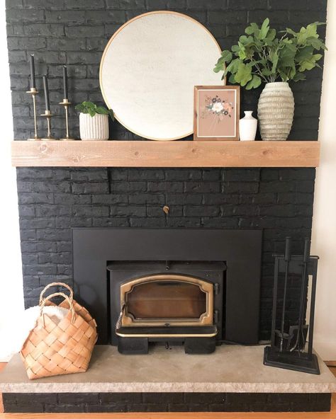 Living Room Brick Fireplace Ideas, Accent Wall With Brick Fireplace, Boho Brick Fireplace, Brick Fireplace Wood Mantle, Dark Gray Fireplace, Black Painted Brick Fireplace, Black Fireplace Living Room, Dark Fireplace Wall, Dark Brick Fireplace