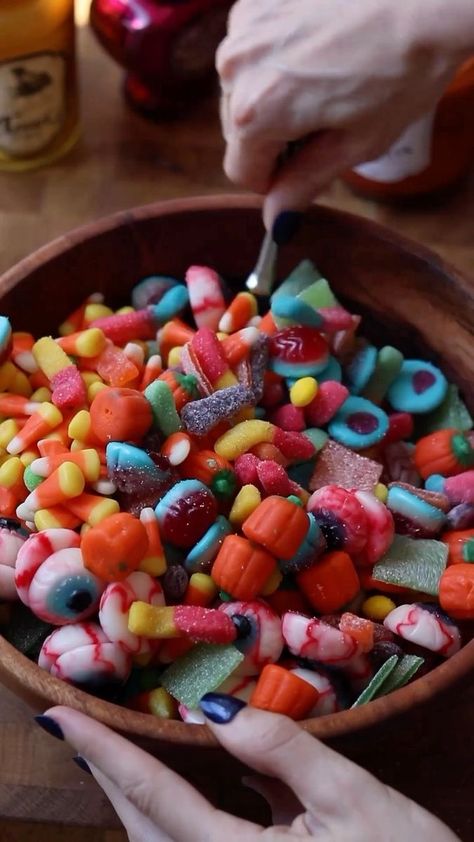 Halloween Candy Salad 🎃 is the perfect easy treat for a spooky party! I used a combination of mellow-crème pumpkins, sour brite worms, gummy brains, zombie sour patch kids, sour skittles, sour belts, candy corn, and gummy eyeballs- most which I found of at Target. #halloweenfood #halloweendesserts #halloweeninspo #halloweeninspiration #spookytreats #spookyszn #halloween #halloweendecor #candysalad #halloweencandy #baking #bake #cakedecorating #baker #halloweenbaking #halloweenideas | Sheri B Gummy Worms Halloween, Halloween Gummy Worms, October Birthdays Ideas, Fall Candy Salad, Candy Shoot For Halloween, Monster Mash Party Food, Creepy Halloween Snacks, Halloween Candy Salad, Spooky Party Snacks