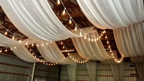 Ceiling draping in a barn. This makes a ... Ceiling Draping Wedding, Wedding Ceiling Decorations, Ceiling Drapery, Diy Drapes, Wedding Drapery, Wedding Draping, Draping Wedding, Wedding Ceiling, Ceiling Draping