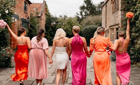 Bright Satin Bridesmaid Dresses, Pink And Orange Wedding Aesthetic, Bridesmaid Dresses Pink Orange, Orange Pink Blue Wedding Bridesmaid Dresses, Bright Colour Bridesmaid Dresses, Pink Orange Bridesmaids, Sunset Colored Bridesmaid Dresses, Sunset Colour Bridesmaid Dresses, Pink Orange Yellow Bachelorette Outfits