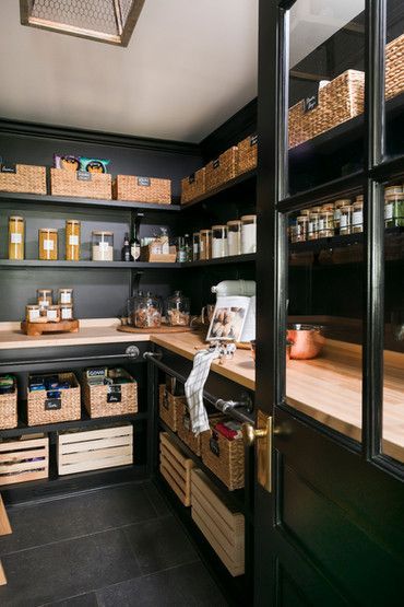 Black pantry by New Jersey based luxury interior design studio, Town & Country Design Studio Dark Pantry Shelves, Pantry With Black Shelves, Walk In Pantry Designs Layout, Luxury Kitchen Pantry, Exposed Pantry, Dream Pantry Walk In, Dark Pantry, Fancy Pantry, Cool Pantry