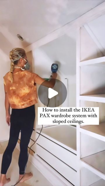 Jodi Bond on Instagram: "Here is part 1 on how I configured the IKEA PAX wardrobe system in my closet with it’s low and sloped ceilings.  I’m currrently working on Part 1 of the project which is the other side of the wall, and then I’ll be painting the space in a glorious color! Follow along for Part 2 coming at you next week!   #ikeapax #ikeahack #walkincloset #closetorganization" Ikea Hacks Sloped Ceiling, Closet In The Attic, Low Sloped Ceiling Closet, Diy Wardrobe Sloped Ceiling, Ikea Pax Slanted Ceiling, Built In Sloped Ceiling, Built In Closet Slanted Ceiling, Slope Ceiling Closet Ideas, Slope Ceiling Closet