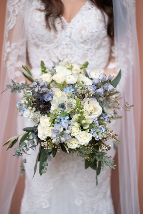 Welcome to my Winter Flower Guide.  Here I will give you a run down of some of my favourite seasonal winter blooms that I love to include in my couples wedding flowers.  It's all about delicate detail, textural berries and seedheads and beautiful foliage when it comes to winter florals. January Wedding Flowers In Season, Winter Wedding Flowers Centerpieces, Winter Wedding Bouquet Blue, Delphinium Wedding Bouquet, Winter Flowers Wedding, Winter Flower Bouquet, January Wedding Flowers, Winter Wedding Flowers Bouquets, Ranunculus Wedding Bouquet