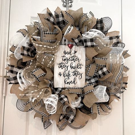 Valentine’s Day Wreath (Or Year Round Sentiment) “And So Together They Built A Life They Loved” Is A Beautiful Year Round Confirmation Of Love Extremely Full 24” Wreath Is Triple Scotch Guarded For Long Lasting Indoor Or Outdoor Use. Easy To Hang, Sealed Wood Center Accent. Black And White Buffalo Check Peppered With Beautiful Textures In White And Naturals. Beautifully Coordinated Linen & Canvas Ribbons Plus Some Fabric Mesh For Durability. Heavy Duty Steel Coated Frame. I Usually Make Mostly C Wreaths For Front Door All Year Round, Polypro Mesh Ribbon Wreath, Trending Wreaths For Front Door, Round Wood Wreath, Black And White Deco Mesh Wreath, Fall Porch Wreath, Cream And Black Decor, Wooden Wreaths For Front Door, Black And White Wreaths For Front Door