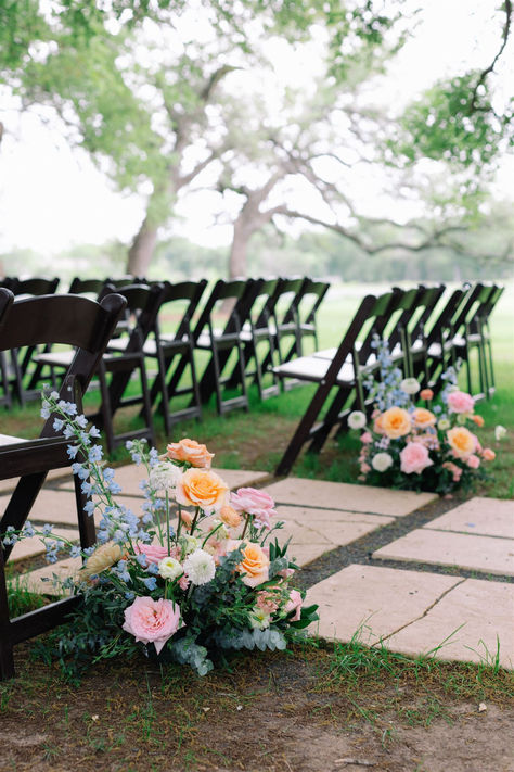 Ceremony wedding flowers. Colorful Aisle Decor, Wildflower Wedding Aisle Decorations, Aisle Marker Flowers, Spring Wedding Aisle Flowers, Wildflower Outdoor Wedding, Unique Aisle Decorations Wedding, Colourful Wedding Ceremony, Diy Aisle Flowers, Wildflower Wedding Aisle