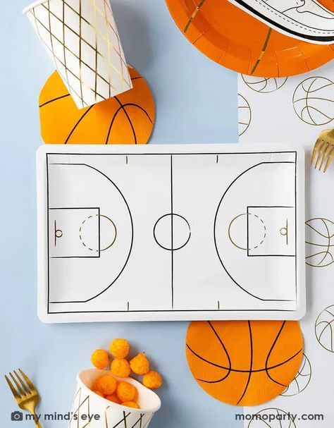 A basketball themed party table features Momo Party's basketball tableware by My Mind's Eye including basketball shaped plates, napkins, basketball court shaped large plates, basketball net gold foil party cups and paper basketball table runner - a perfect table setting inspo for kid's basketball themed birthday parties or a fun NBA viewing party! Basketball Theme Party, Basketball Birthday Parties, Paper Table Runner, Net Design, Basketball Party, Basketball Theme, Paper Cocktail Napkins, Basketball Birthday, Basketball Net