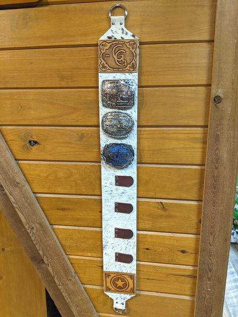 Belt Buckle Wall Display, Belt Buckle Storage Ideas, Leather Belt Buckle Display, Livestock Ribbon Display, Cowhide Display Ideas, Rodeo Buckle Display, Western Belt Buckle Display, Buckle Holder Diy, Diy Buckle Display