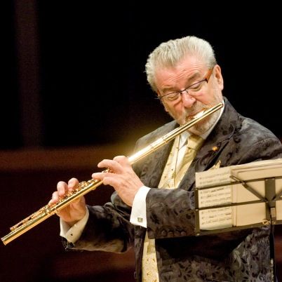 Sir James Galway OBE (born 8 December 1939) is a virtuoso flute player from Belfast, Northern Ireland, nicknamed "The Man With the Golden Flute".  Following in the footsteps of Jean-Pierre Rampal, he became one of the first flute players to establish an international career as a soloist. James Galway, Playing Flute, Flute Player, Woodwind Instruments, Flute Music, Oral History, First Language, Galway, Art Poses