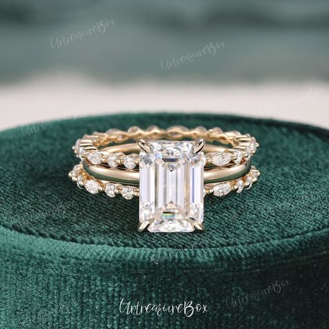 Engagement Rings Emerald Cut 3ct Moissanite Hidden Halo Yellow Gold Wedding Ring Set 3pcs Stacking Ring Cluster Band Unique Ring Bridal Set More you may like: https://www.etsy.com/listing/1460424323 * Order Service: Engraving/Rush Order/ Shipping Upgrade/ Size Upgrade/ 18K or Platinum upgrade https://www.etsy.com/listing/889751602/ Jewelry Details: * Center Stone:  * Moissanite, Emerald cut * Color: D color * Clarity: VVS * Measures: about 2.5ct, 7*10mm  * Select when you check out * Accents: ab Emerald Cut Ring Sets, Emerald Cut Halo Wedding Rings, Double Halo Emerald Cut Engagement Ring With Wedding Band, Emerald Wedding Ring Set Stack, Emerald Ring Wedding Band, Radiant Wedding Ring Stack, Emerald Ring Stack Wedding Bands, Unique Engagement Rings Gold Band, Yellow Gold Wedding Ring Stack