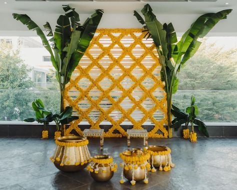 We’re Obsessed With These Sunshine-Themed Haldi Decor Ideas | WedMeGood Indian Backdrop Ideas For Pooja, Backdrop Floral Backgrounds, Low Budget Stage Decoration, Floral Background Decoration, Marigold Backdrop Decoration, Low Budget Ganpati Decoration, Decoration With Marigold Flowers, Low Budget Haldi Decoration, Backdrop Ideas For Ganpati Decoration