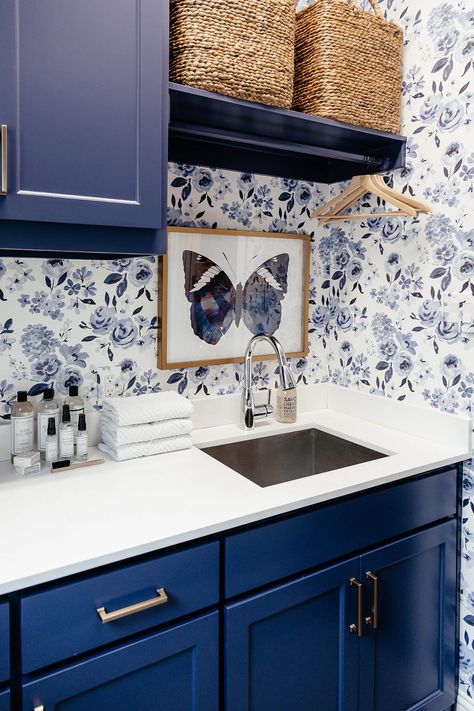 brighton keller laundry room blue and white print wall paper navy blue painted cabinets cute laundry room Blue Painted Cabinets, Blue Laundry Rooms, Laundry Room Wallpaper, Farmhouse Side Table, Laundry Room Cabinets, Blue Cabinets, Small Laundry Room, Small Laundry, Laundry Room Storage