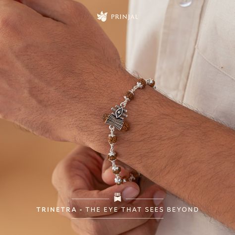 Rudraksha Silver Shiva Third Eye Bracelet, featuring the divine symbolism of Mahadev's Third Eye and Damru in a single-line design for men. Get this today at 25% off Order Now at www.prinjal.com . . . #rudrakshabracelet #silverbracelet #braceletformen #rudrakshajewelry #rudrakshamala #rudrakshapendant #damru #thirdeye #shivaeye #shivabracelets #shravan #mahadev Shiva Third Eye, Rudraksha Jewelry, Rudraksha Bracelet, Shiva Eye, Rudraksha Mala, Eye Bracelet, The Divine, Line Design, Third Eye