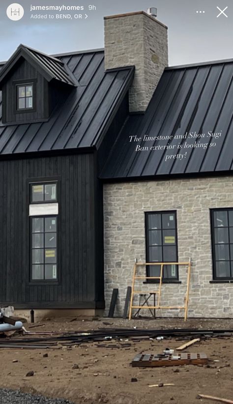 New Build Modern Farmhouse, Ledger Stone House Exterior, Limestone House Black Trim, Covered Walkway Between House And Garage, Dark House With Stone, Black House With Stone Accents, Limestone And Black House Exterior, Stone And Dark Siding Exterior, Black House With White Brick