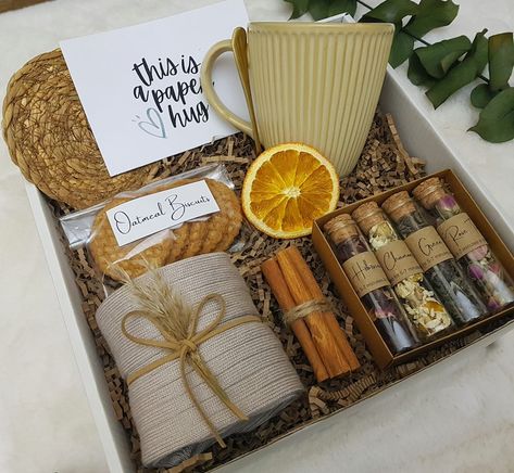 We hope you love autumn as much as we do! It's a perfect time to spend with your family near the fireplace with a cup of hot chocolate and little marshmallows in them. This gift box has everything for you to spend a cozy, warm, sweet time with your family. The gift box includes: 🍁 Ceramic mug 🍁 Warm wool socks 🍁 Glass jar of caramels 🍁 Coaster 🍁 Beverage your choice 🍁 Marshmallows 🍁 Golden tea spoon Fall gift box, extra cozy gift box, hygge gift basket, birthday Breakup Care Package, Care Package Birthday, Gift Basket Birthday, Hygge Gift Basket, Sympathy Gift Baskets, Fall Gift Baskets, Chocolate Basket, Golden Tea, Tea Gift Box