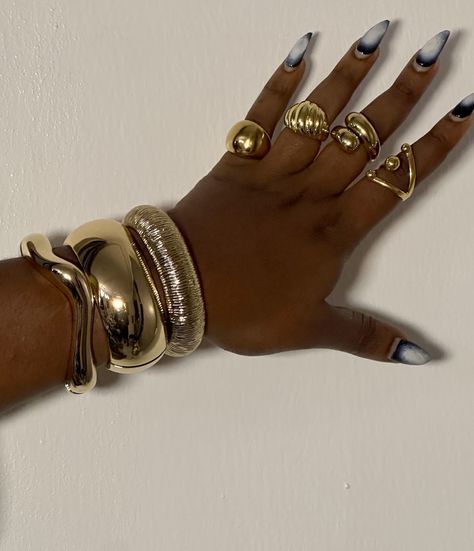 Style Mospiration 😍😍😍 A stack of our Wan, Fawn and Noor bracelets 😍😍😍 Chunky rings also available 🤍🎀 #chunkyrings #statementrings #goldrings #goldbracelets #howtostylejewelry #jewelryinlagos #jewelrystoreinlagos #longlastingjewelry #affordablejewelry Gold Rings Classy, Chunky Bangle Bracelets, Gold Ring Stack Chunky, Chunky Jewelry Aesthetic, Chunky Rings Aesthetic, Ring Stacking Ideas, Chunk Jewelry, Chunky Bangles, Maximalist Jewelry