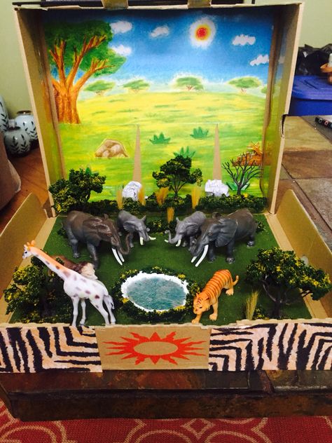 My daughters 3rd grade project, Diorama of African Savannah Habitat with added special effects soundtrack of the Lion King. Hippo Habitat Diorama, Hippo Diorama, Rainforest Project, Biomes Project, Diorama Kids, Ecosystems Projects, Habitats Projects, Animal Habitats, Animal Projects