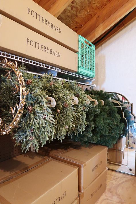 Are you looking for a better way to store your Christmas wreaths? A smart new solution to store, organize, and keep your wreaths looking good! Create hanging storage in a garage, attic, closet, or basement. #wreathstorage #howtohangwreaths #organizechristmasdecor #hangwreaths #porchdaydreamer Unfinished Attic, Store Christmas Decorations, Attic Organization, Christmas Decoration Storage, Easy Ornaments, Wreath Storage, Storing Christmas Decorations, Attic Room, Holiday Storage