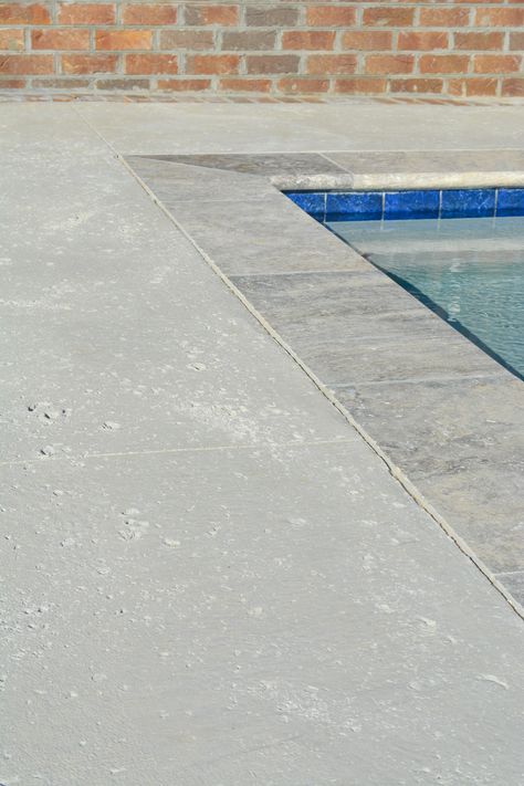 Salt Finished Concrete Pool Deck and Natural Stone Coping Travertine Grey Blue Swimming Pool Tile Travertine Pool Coping With Concrete Decking, All Tile Pool, Bluestone Coping Around Pool, Natural Stone Coping Around Pool, Concrete Salt Finish, Salted Concrete Pool Deck, Salt Concrete Finish, Swimming Pool Coping Ideas, Travertine Coping Around Pool