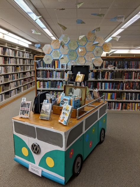 Elementary School Library Decorating Ideas, Reading Takes You Places, Summer Book Display, Summer Library Display Ideas, Library Adventure Theme, Travel Library Display, Book Truck Library, Summer Reading 2024, Summer Library Displays