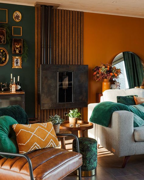 Rooms With Dark Green Accents, Orange Black And Green Bedroom, Dark Orange Wall Color, Orange Green Home Decor, Burnt Orange And Green Bedroom Decor, Green And Rust Office, Dark Color Living Room Ideas Cozy, Moody Orange Living Room, Orange And Green Living Room Ideas