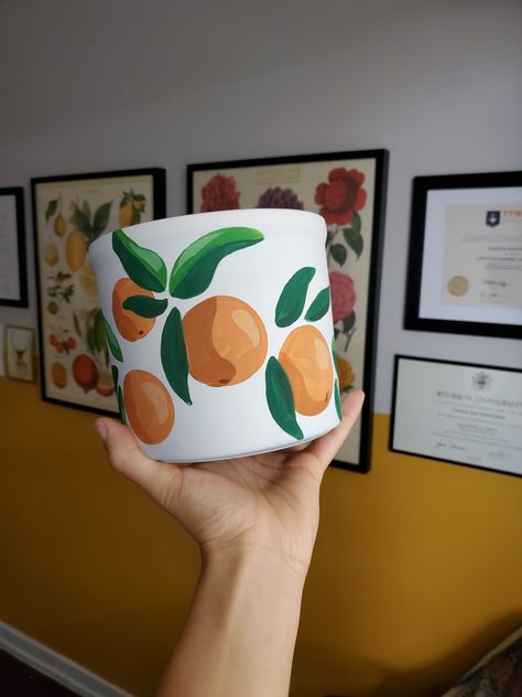 Tip Jar Painting Ideas, Clay Pot Plant, Pottery Painting Inspo Plant Pot, Clay Pot Designs Pottery Ceramic Art, Acrylic Painted Pots, Orange Plant Pot, Pottery Painting Designs Plant Pots, Paint Plant Pot Ideas, Ceramic Plant Pot Painting Ideas