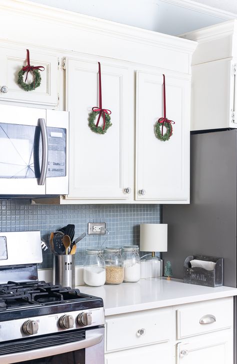 Decorating the Kitchen for Christmas - Mini Wreaths on Kitchen Cabinet Doors - Red Velvet Ribbon and Wreaths Creative Tile, Christmas Decorating Ideas, Christmas Kitchen Decor, Christmas Decorations Diy Outdoor, Fabulous Christmas, Household Furniture, Cabinet Decor, Christmas Kitchen, Decoration Christmas