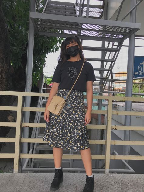 Black midi skirt | simple black tee | ankle boots T Shirt And Midi Skirt, Graphic T Shirt And Skirt Outfit, Black Skirt With Flowers Outfit, Midi Skirt Outfit Tshirt, Mid Size Midi Skirt Outfit, Black Midi Skirt Outfit Spring, Tshirt And Long Skirt Outfits, Midi Skirt With Tshirt, Black Floral Midi Skirt Outfit