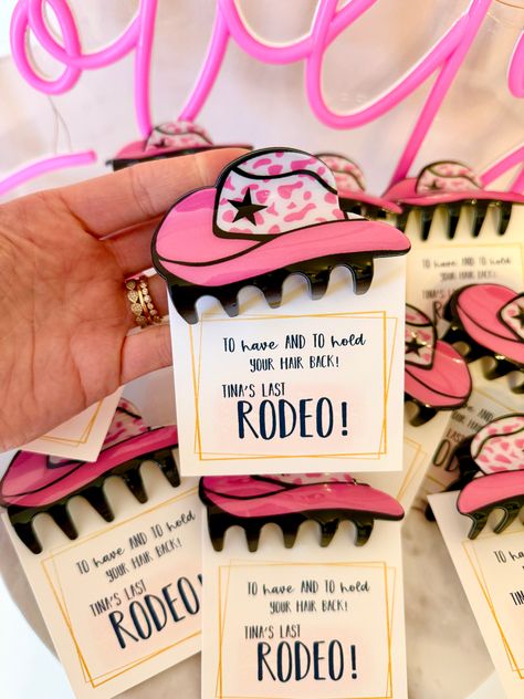 Bachelorette Party gift favor! I can personalize the cards to say anything you would like! Leave a message at check out with information.With your purchase you receive:1 Personalized CardPink Cowgirl Hat Claw Clip (acrylic)THE LOVE LEIGH GIFT PROMISE: Our goal is to hand make you a one of a kind memorable gift! We love what we do and want to share the love! Bachelorette Party Theme Cowgirl, Nashville Bachelorette Party Bags, Bachelorette Party Souvenirs, Last Rodeo Bachelorette Party Favors, Funny Bachelorette Decor, Bridal Shower Cowgirl Theme, The Last Hoedown Bachelorette, Austin Tx Bachelorette Party Theme, Cowboy Hens Party