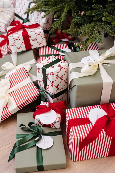 Anthropologie Christmas Gift Wrapping, Ralph Lauren Wrapping Paper, Christmas Wrapping 2024 Trends, Red Green Plaid Christmas Decor, Red Ribbon Gift Wrapping Ideas, Red And White Wrapping Paper, Christmas Gift Wrapping Ideas Red, White Christmas Present Wrapping, Gift Wrap Themes For Christmas