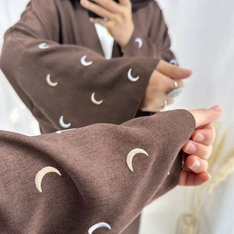 'TABITHA' Shop now: https://eolanteclothing.com/products/front-open-moon-sleeves-abaya-with-belt-tabitha #ootd #modestfashion #eolanteclothing #modeststyle #modestclothing # #instafashion #modestoutfits #elegantmodesty #muslimahfashion #modestvibes #abayastyle #modestfashionblogger #summervibes #summerdress #moonabaya #moonembroidered #abayamoon Abaya Kimono, Open Abaya, Abaya Designs, Streetwear Shop, Scarf Sale, Abaya Dress, Eid Gifts, Women Wholesale, Luxury Dress