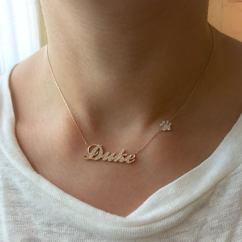 This unique personalized script font nameplate cut-out necklace is composed of 14K solid gold and beautifully pavé set with genuine GVs1 quality natural real Diamonds. This pendant is complemented by a durable 14K solid gold adjustable chain or can be purchased as a charm alone without the chain under the "Length" drop-down menu. NOTE: The item will be made in the exact casing of the characters entered. Please be mindful of this detail when providing the customization desired. Name Dimensions: a Real Gold Necklace, Solid Gold Necklace, Script Font, Link Necklace, Real Diamonds, Jewelry Gift Box, Name Necklace, Pave Diamonds, Heart Necklace